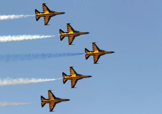 CRYPTONEWSBYTES.COM yellow-jets-maneuvering-sky-during-air-parade_181624-16775-640x450 Chainalysis Report: Ukraine War Accelerated Russian Stablecoin Adoption  