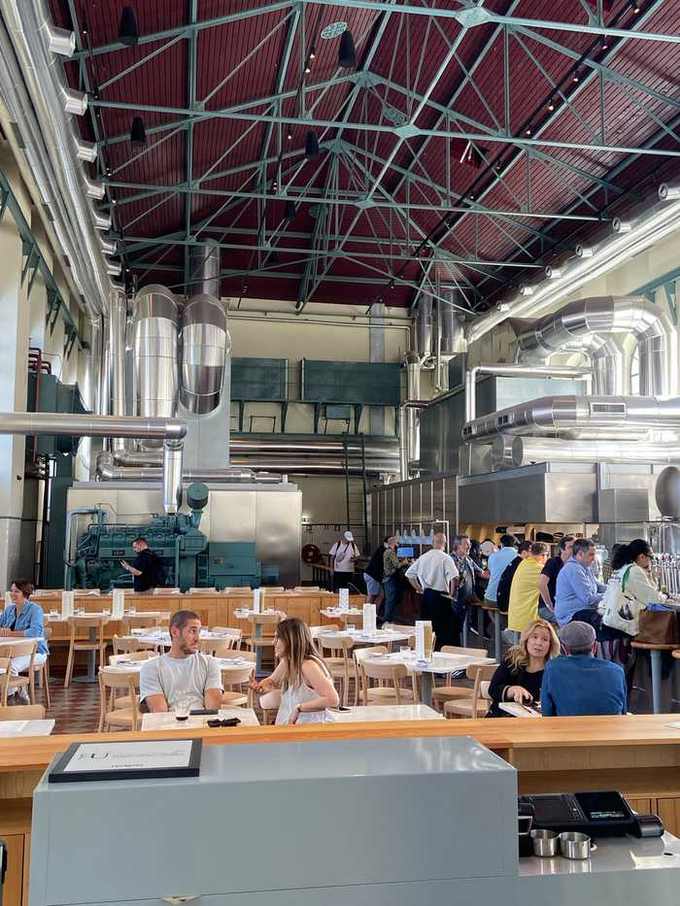 Interior of Unicorn Factory Lisboa main hall during NFC Summit 2026 lunch break